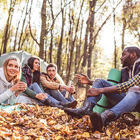 friends camping in the fall