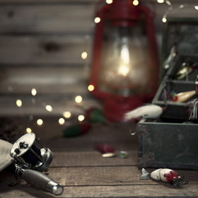 fishing rod, christmas lights, tackle box with lures