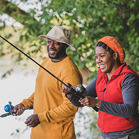 Couple fishing at a lake