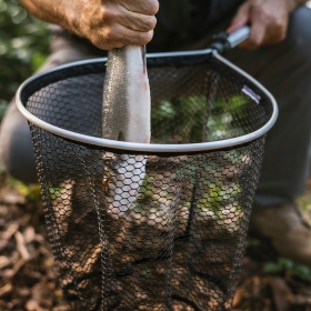 angler holding a saltwater fishing net