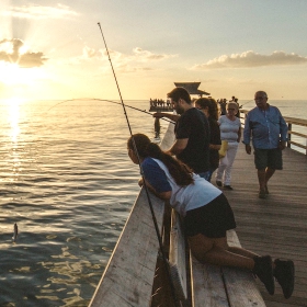 father and daughter following these pier fishing tips