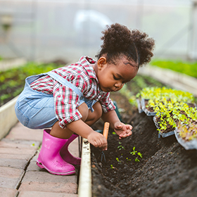 Little girl at garden