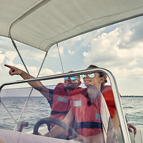 two people on a boat