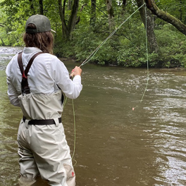 woman fly fishing