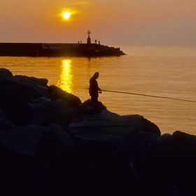 angler using a lifetime fishing license