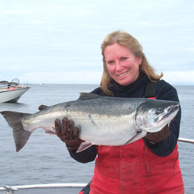 woman catching salmon