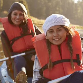 Mom and daughter boating