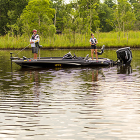 Man and woman fishing from a boat