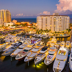 Boats at marina at dusk