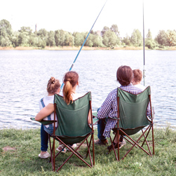 family fishing on a pond