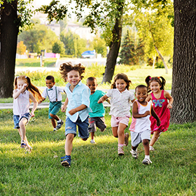 Kids running at a park