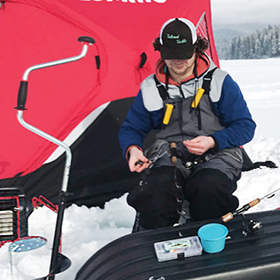 Man ice fishing