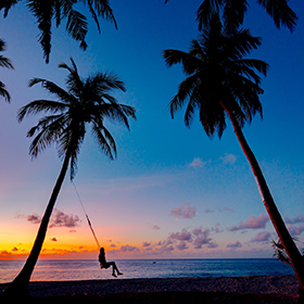 Person on hammock at the beach