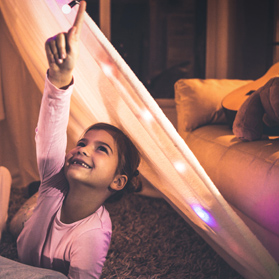 kid on a indoor tent