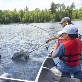 family fishing trip lake 