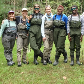 female anglers fly fishing