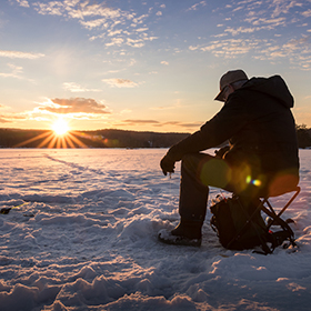 Man ice fishing