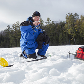 Man ice fishing