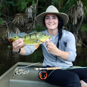 woman fishing in a boat