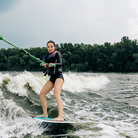 Woman wake surfing