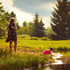 kids fishing on a pond