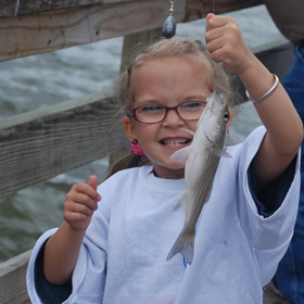  little girl pier fishing