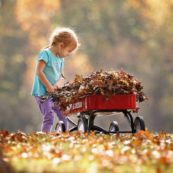 little girl playing outside