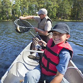 father and son fishing in Minnesota walleye