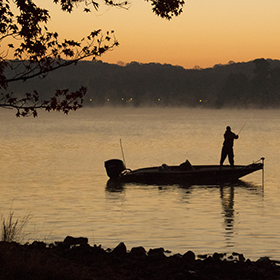 Man fishing on lake