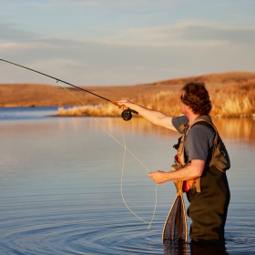 angler practicing these fly fishing safety considerations