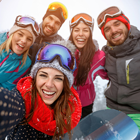 A group of friends wearing outdoor gear