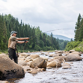 fly fishing on a river 