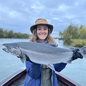 Woman holding fish