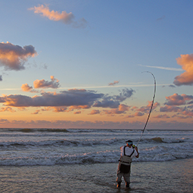 Man surf fishing