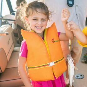 girl holding her first catch