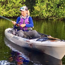 woman kayaking