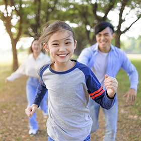 Family playing outside