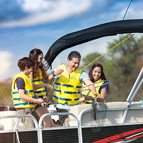 Family fishing from boat