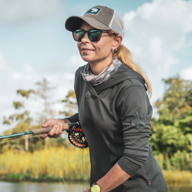 Woman Fishing with a Fly Rod