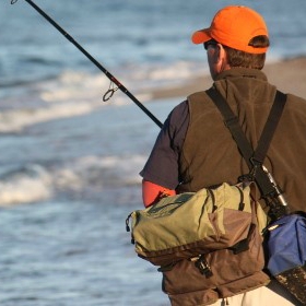 an angler goes surf fishing with all the surf fishing equipment basics checked off