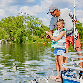 father and daughter fishing