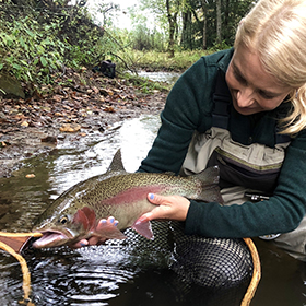 Woman holding trout