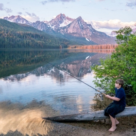 Kid fishing in Idaho Hidden Gem with his family